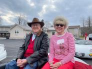 man and woman smiling
