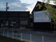 movie on an outdoor projector screen