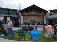 group of people watching a band play