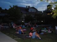 crowd watching an outdoor movie