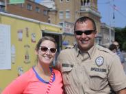 man and woman smiling
