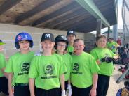 kids in baseball uniforms