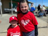 kids in baseball uniforms