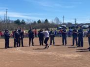 woman throwing softball