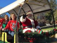santa and children in christmas parade