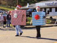 people dressed as christmas presents